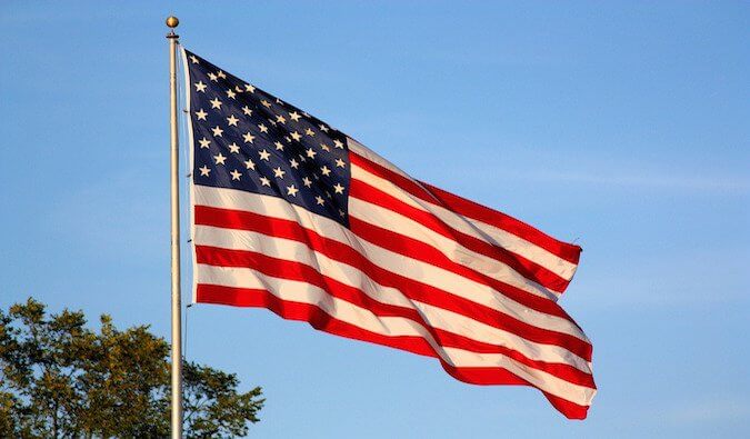 A giant American flag waving in the wind