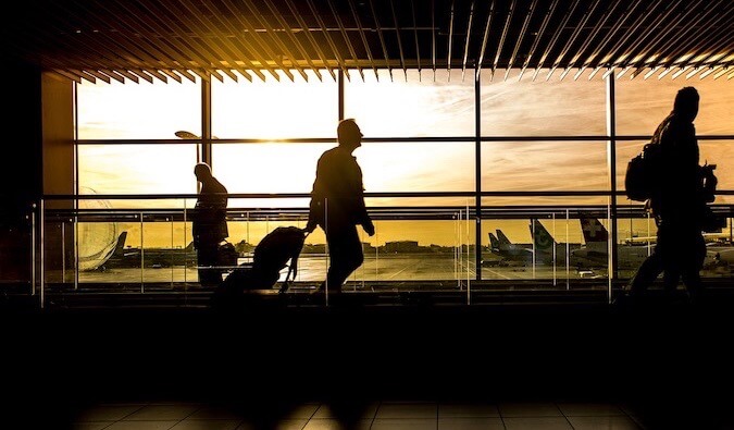 An airport terminal at sunset