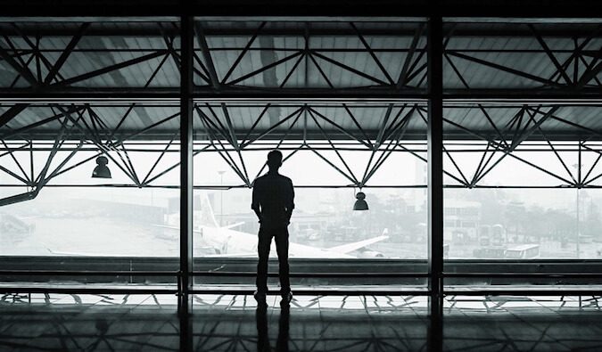 A man looking outside by himself