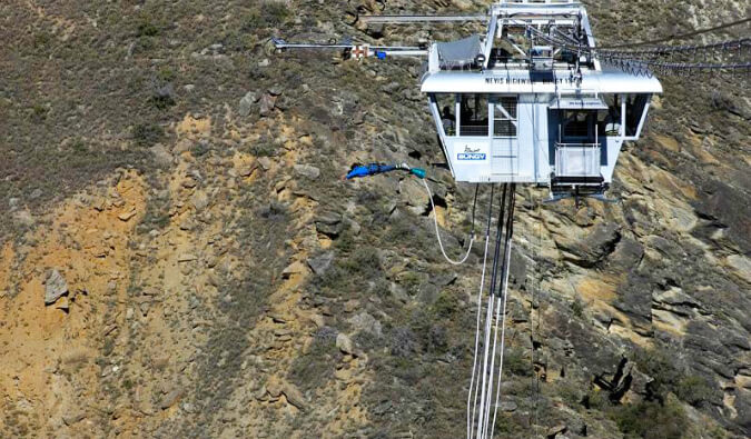 a man bungie jumping in the Nevis