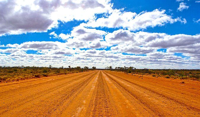 A dirt road going into the horizon in Western Australia