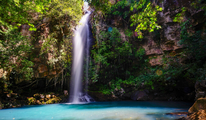 a beautiful waterfall in the Costa Rican jungle