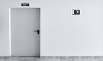 A black and white office exit