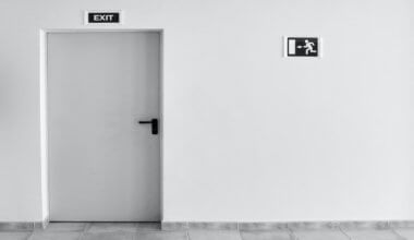 A black and white office exit