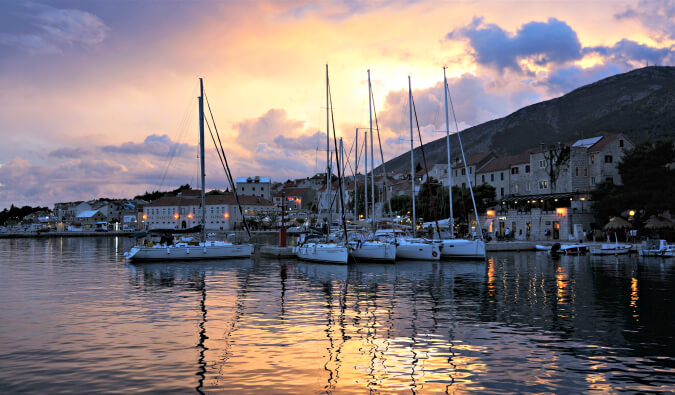 Sailboats on a harbour in Croatia during sunset