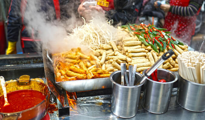 image of street food being prepared with steam coming off