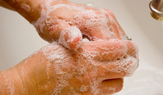 Picture of someone washing their hands
