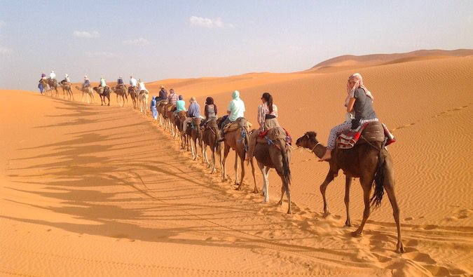 A camel ride in the desert in Morocco