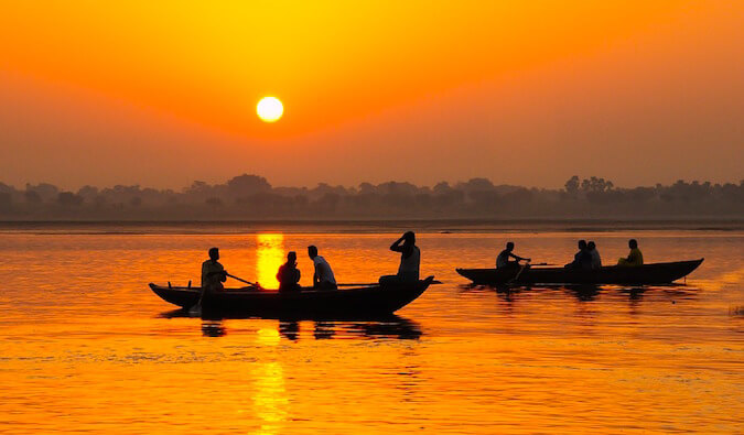Sunset over a river in India
