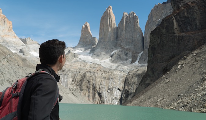 Nomadic Matt reflecting at Torres Del Paine in Chile