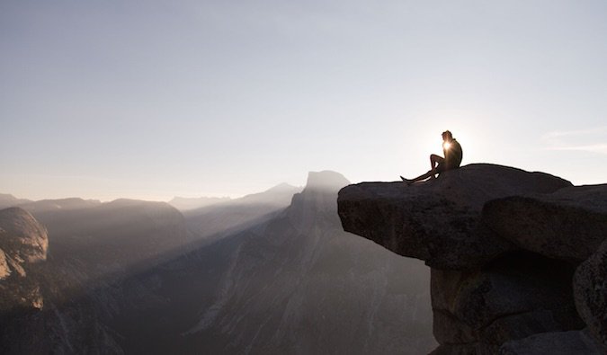 A guy overlooking a mountain