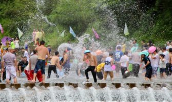 People having a water fight in Thailand during Songkran