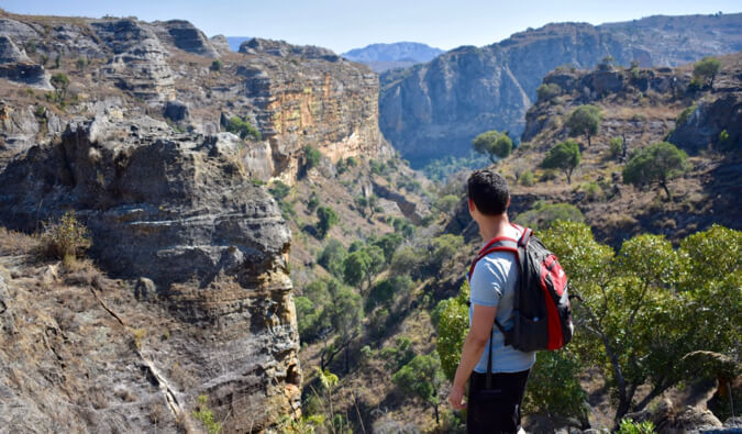 Nomadic Matt looking out over a valley in Madagascar