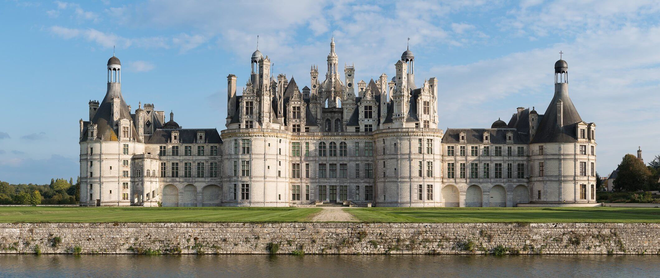 a grand palace in France on the water