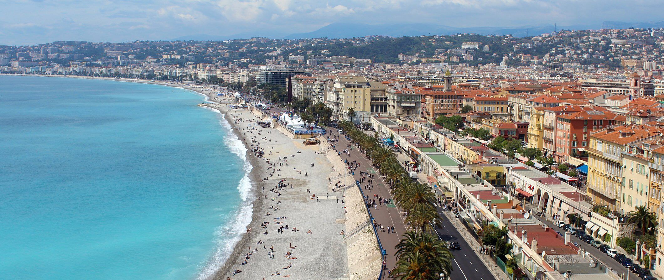 Beach in Nice France. People sunbathing