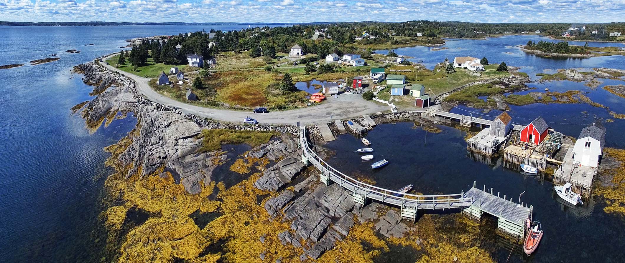 Areal view of Nova Scotia - houses, boats, small Islands surrounded by water