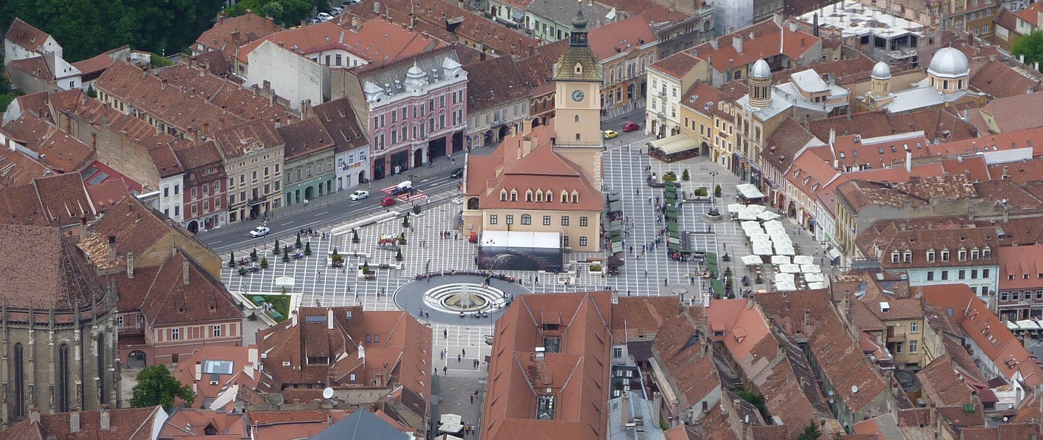 areal view of Brasov in Romania looking down over the town centre church