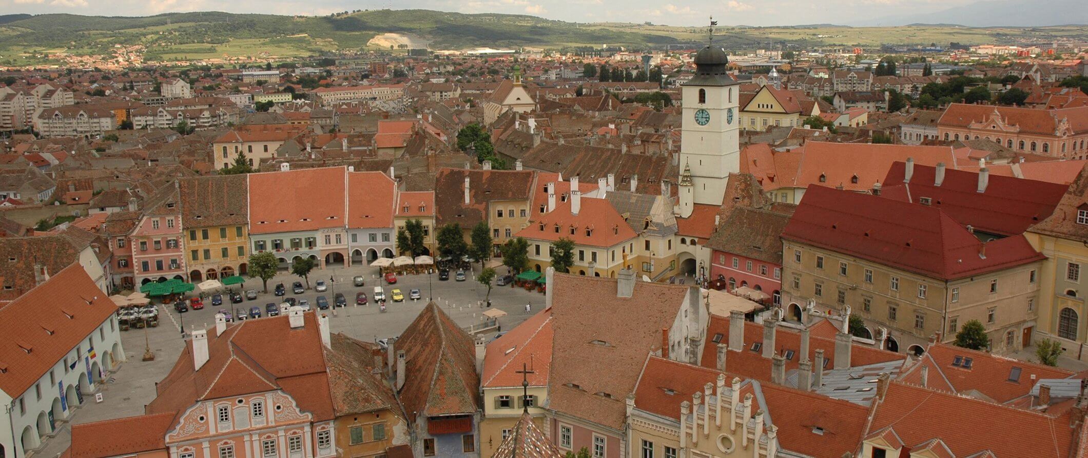 city view of Sibiu looking down over buildings and a car park