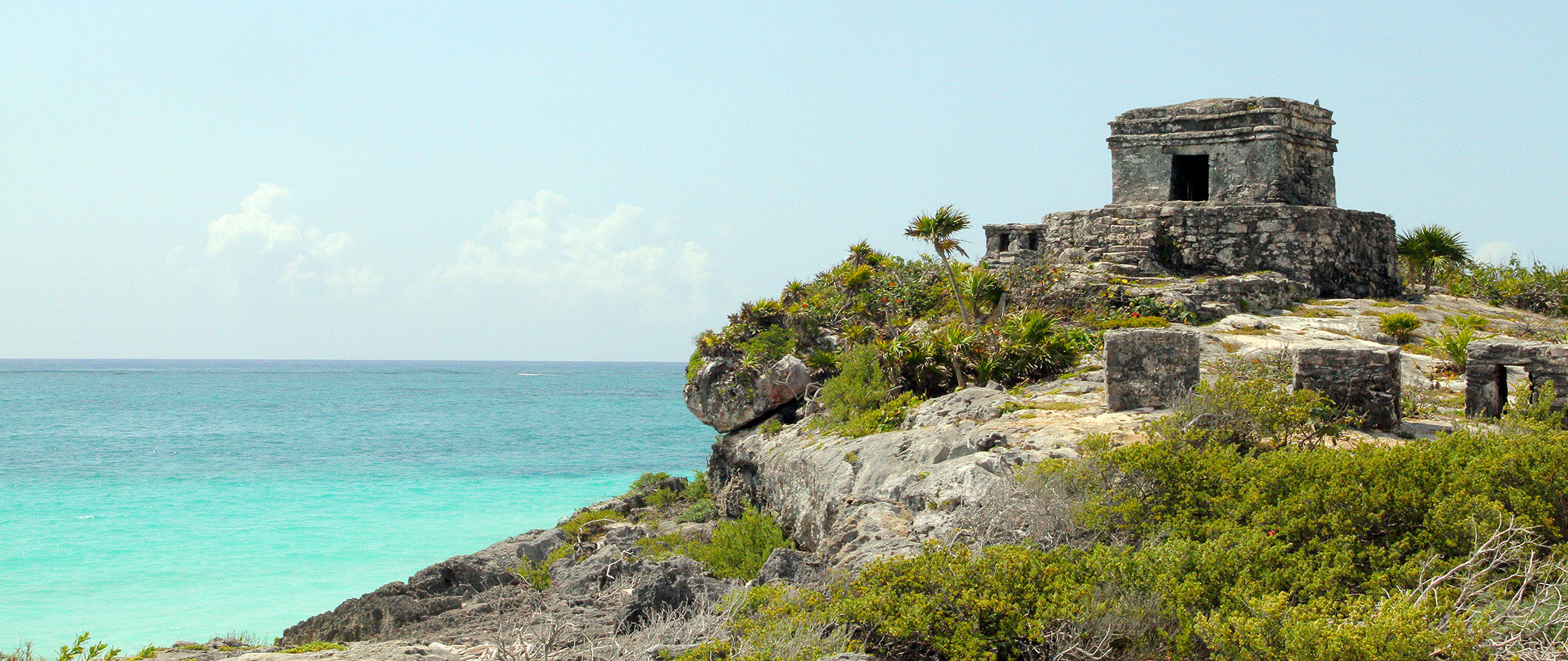 Iconic image of Tulum Ruins high above the Caribbean sea