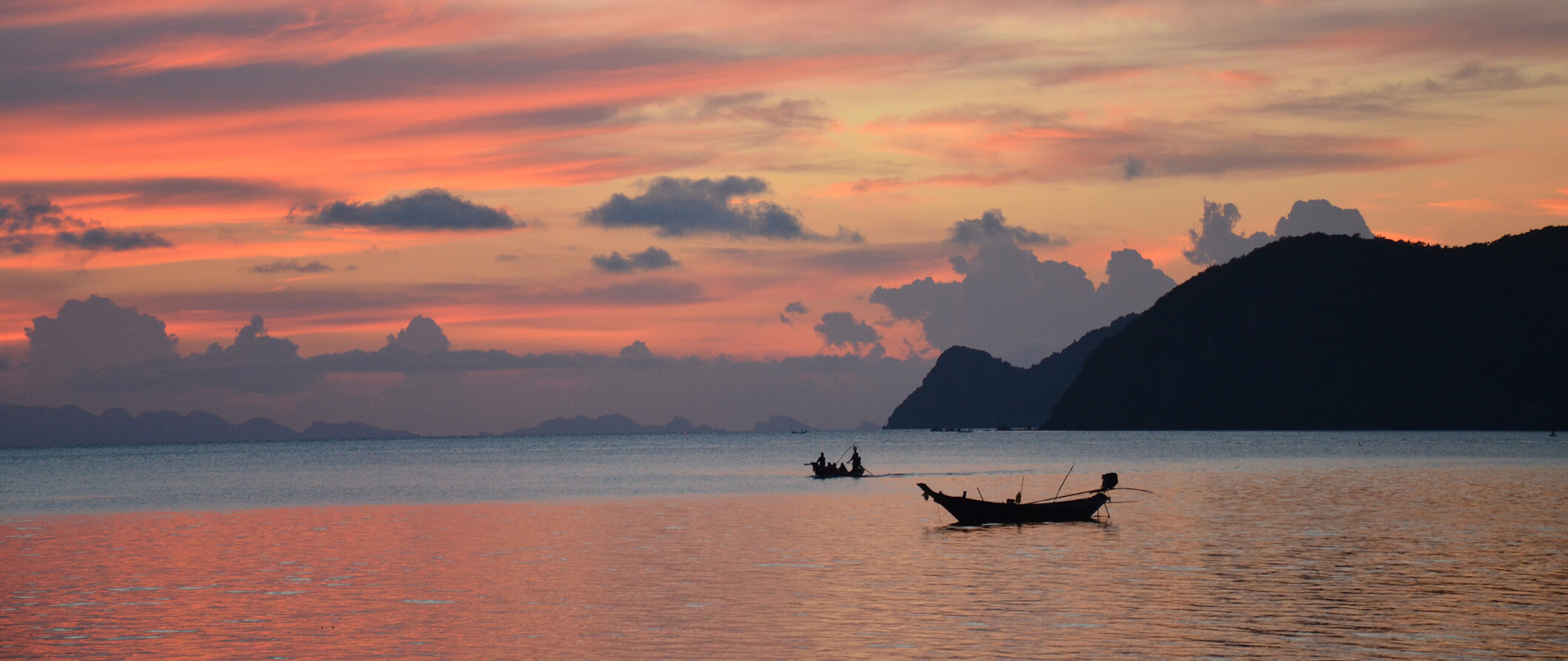 Fishing boats in Koh Phangan out to sea taken at dawn