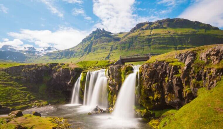 A beautiful waterfall in sunny, rugged Iceland