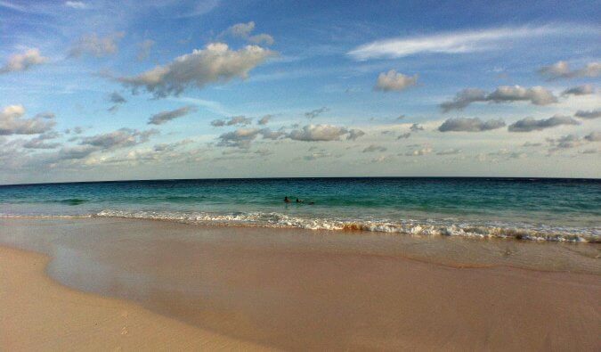 beach sea sand ocean and clouds