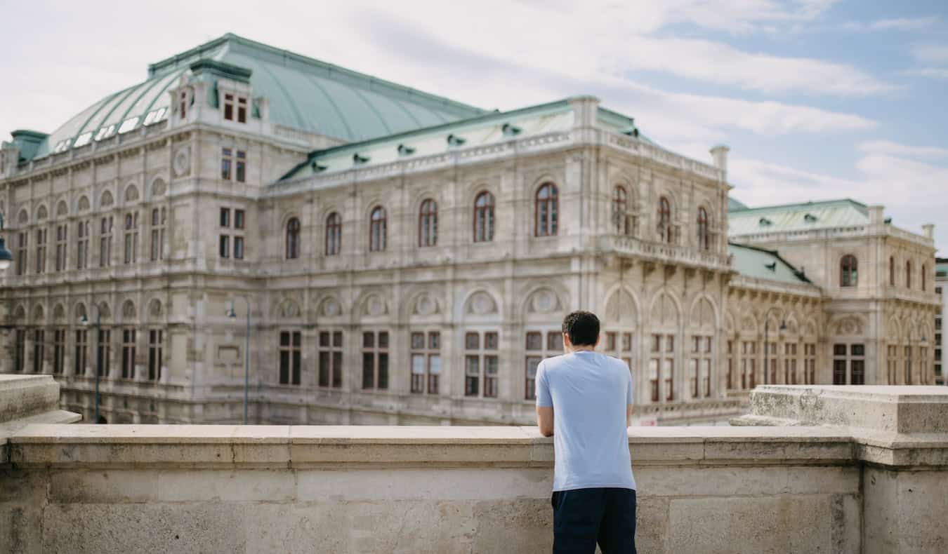 Nomadic Matt posing for a photo in sunny Vienna, Austria