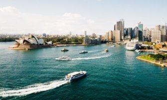 Sydney skyline with boats in harbor