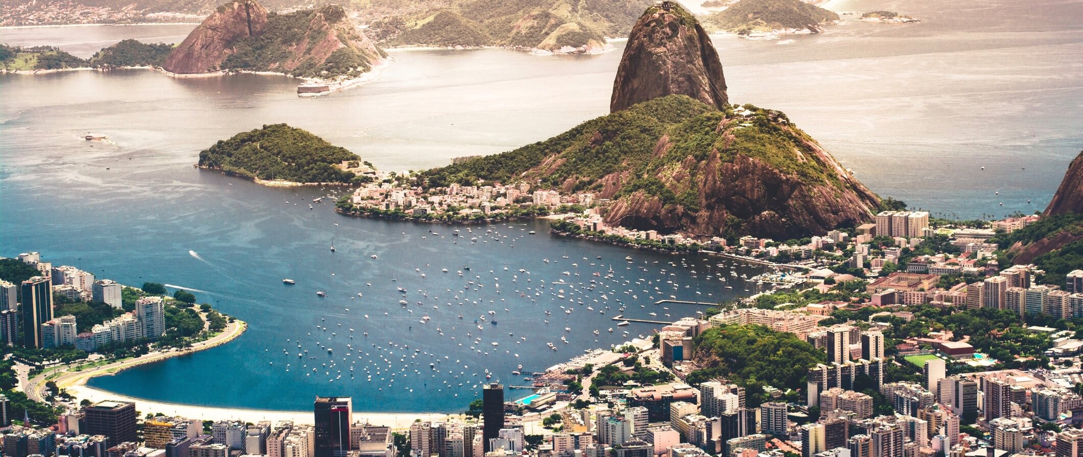 Brazil city beach and sea with many boats in the bay