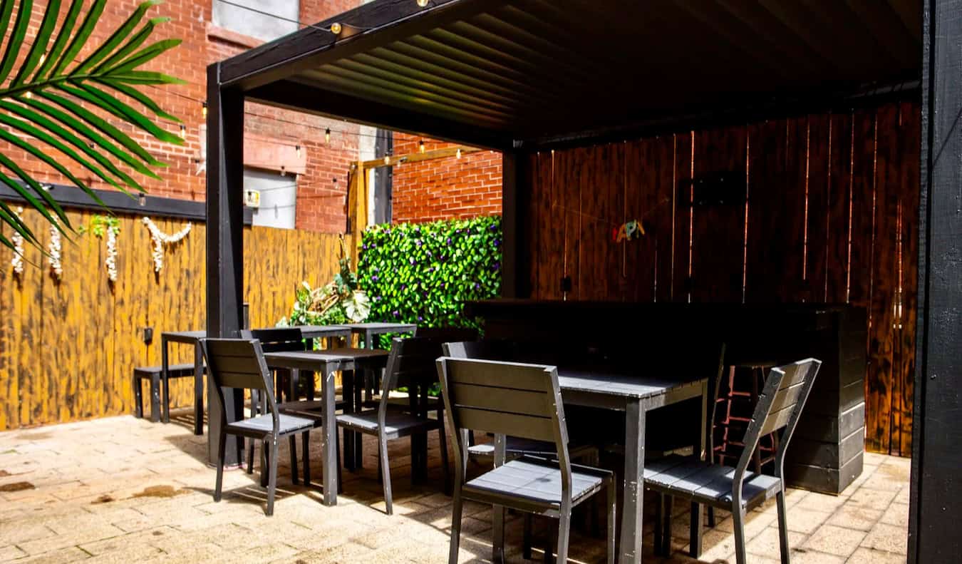 The relaxing patio area of the Kama hostel in NYC