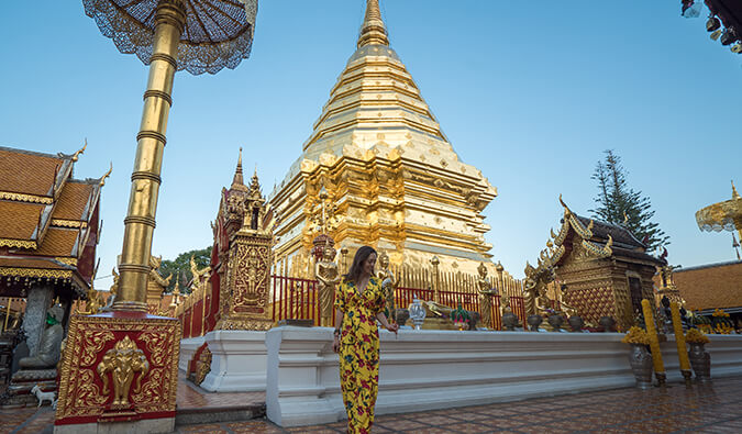 Kristin Addis in front of a pagoda in Thailand