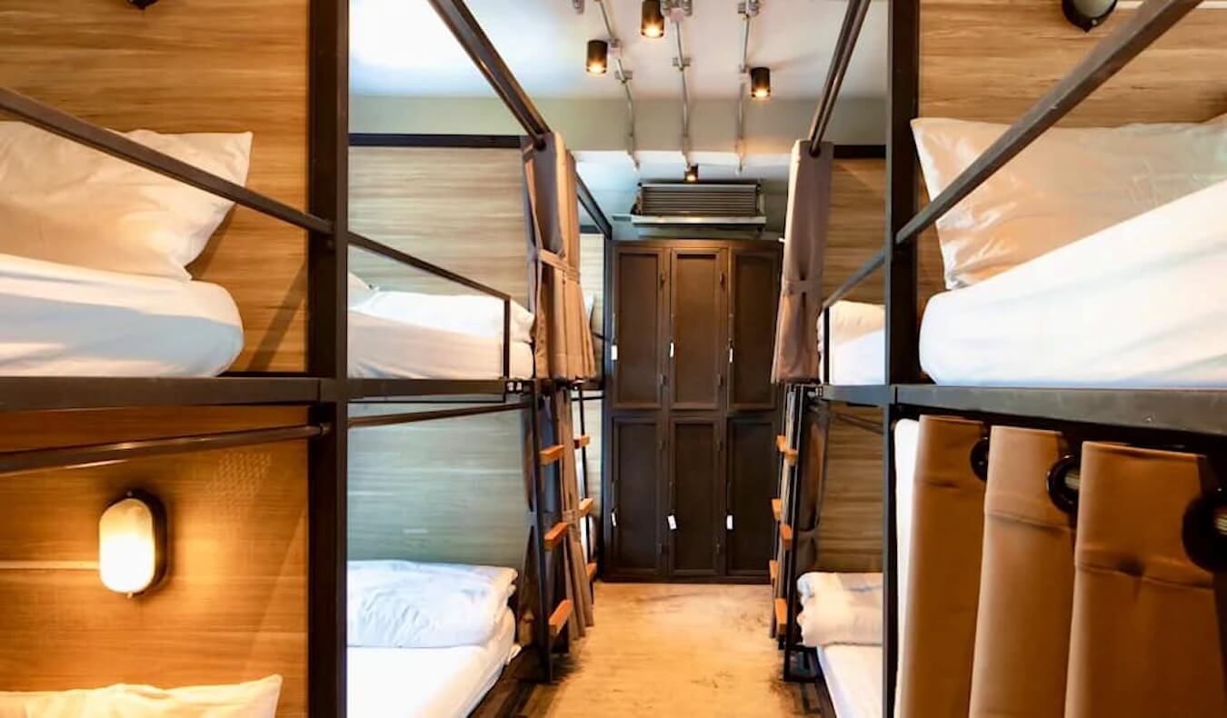 A cozy dorm room at Bed Station hostel in Bangkok
