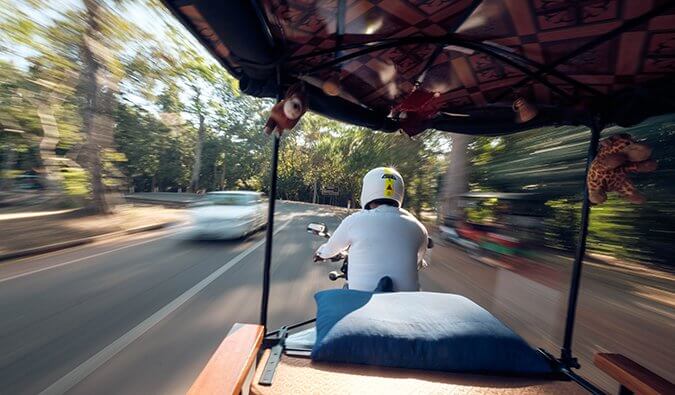 View from the back of a tuk-tuk in Southeast Asia