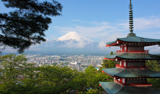 a pagoda in Japan overlooking Mount Fuji