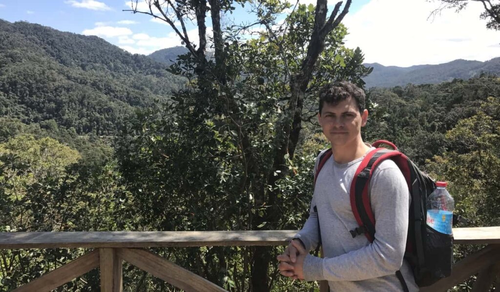 Nomadic Matt with his backpack on looking at the camera