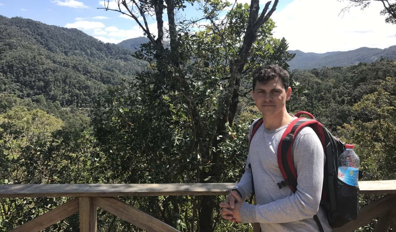 Nomadic Matt with his backpack on looking at the camera