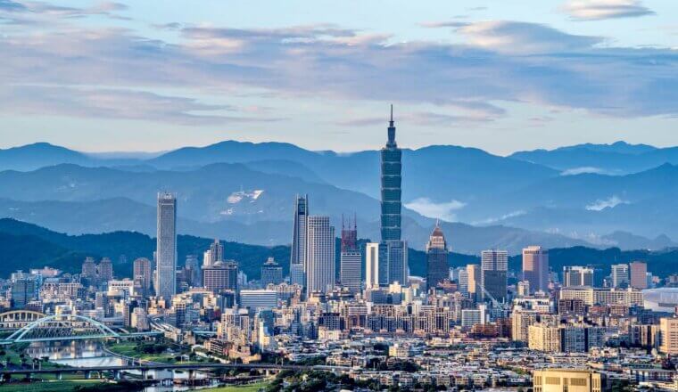 The towering skyline of Taipei, taiwan featuring the Taipei 101 tower