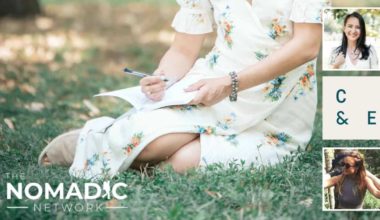 A woman journaling in the grass