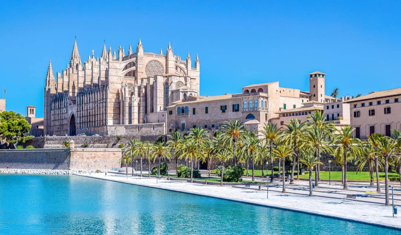 A huge, historic Cathedral in Palma de Mallorca in Spain during the summer