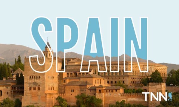 Historic buildings and a golden landscape in Southern Spain