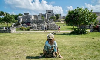 Solo female traveler Kristin Addiss in Mexico admiring some ancient ruins