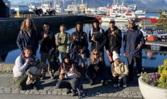 A group of FLYTE students from Hawaii posing fora class photo in Iceland