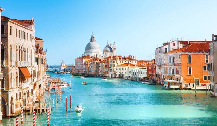 Aerial view of Venice, Italy with boats floating down the canals