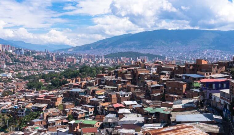 Panoramic views of the city of Medellin spread across the hills