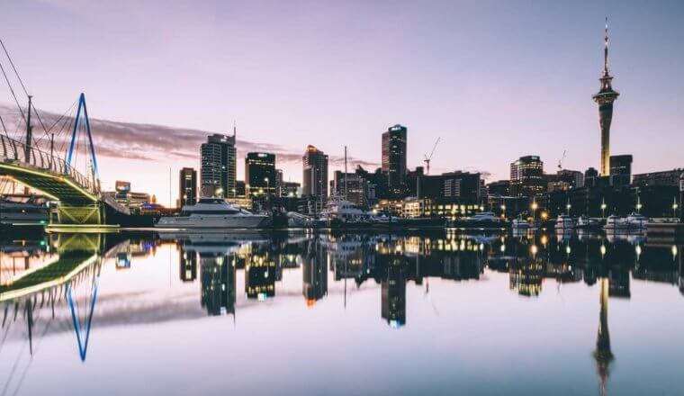 The harbor and skyline of Auckland, New Zealand, at night