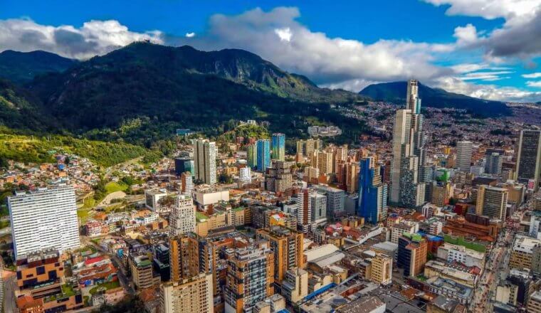 The skyline of Bogota, Colombia, with skyscrapers up against the lush Andes mountains
