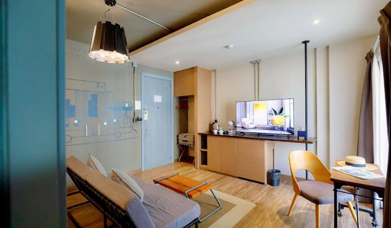 A chic, colorful hotel room at the THA City Loft Hotel in Bangkok