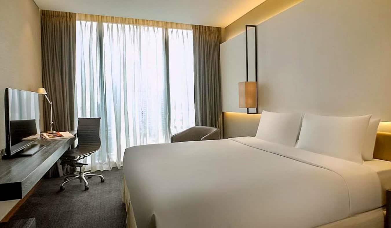 The spacious interior of a luxury room at the Amara hotel in Bangkok, Thailand