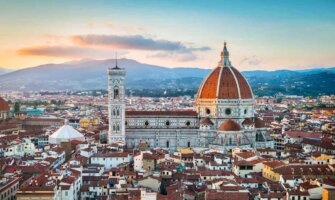 The famous dome of the cathedral poking up from the stunning skyline of historic Florence, Italy