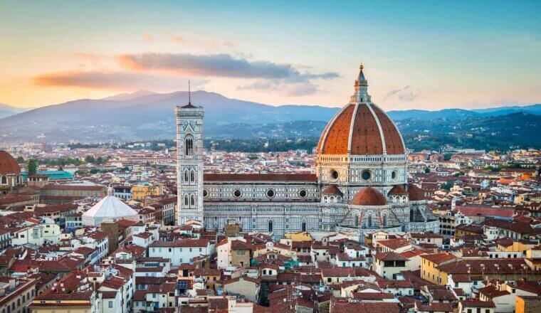 The famous dome of the cathedral poking up from the stunning skyline of historic Florence, Italy